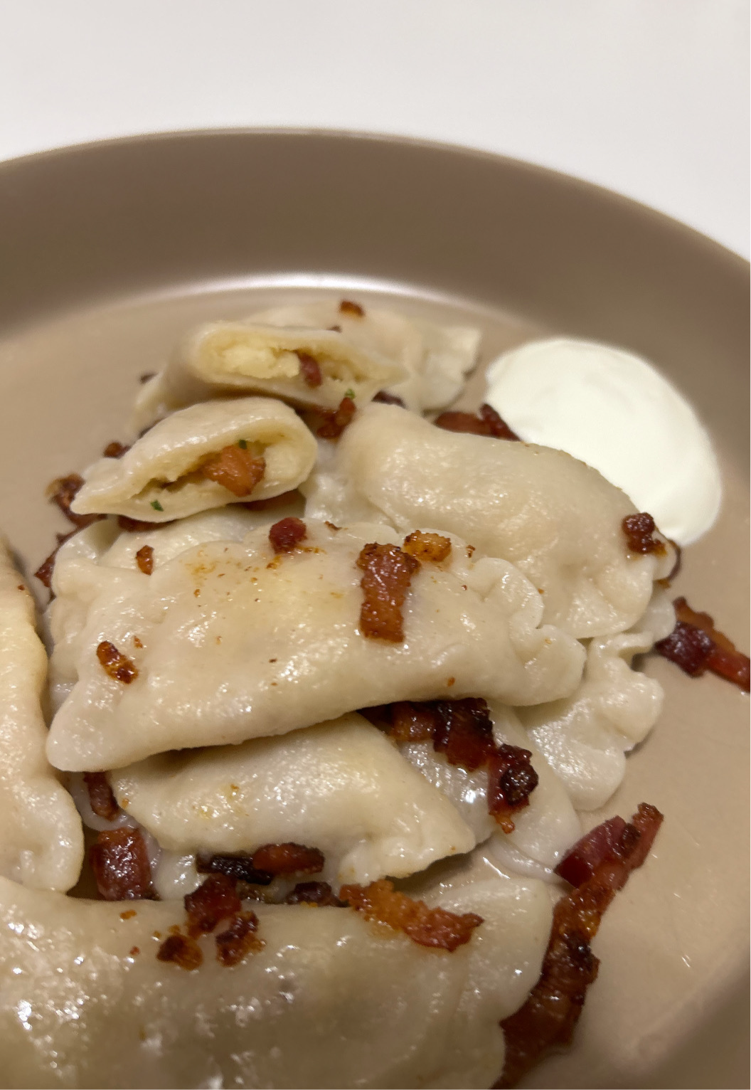 Homemade dumplings with potato and bacon