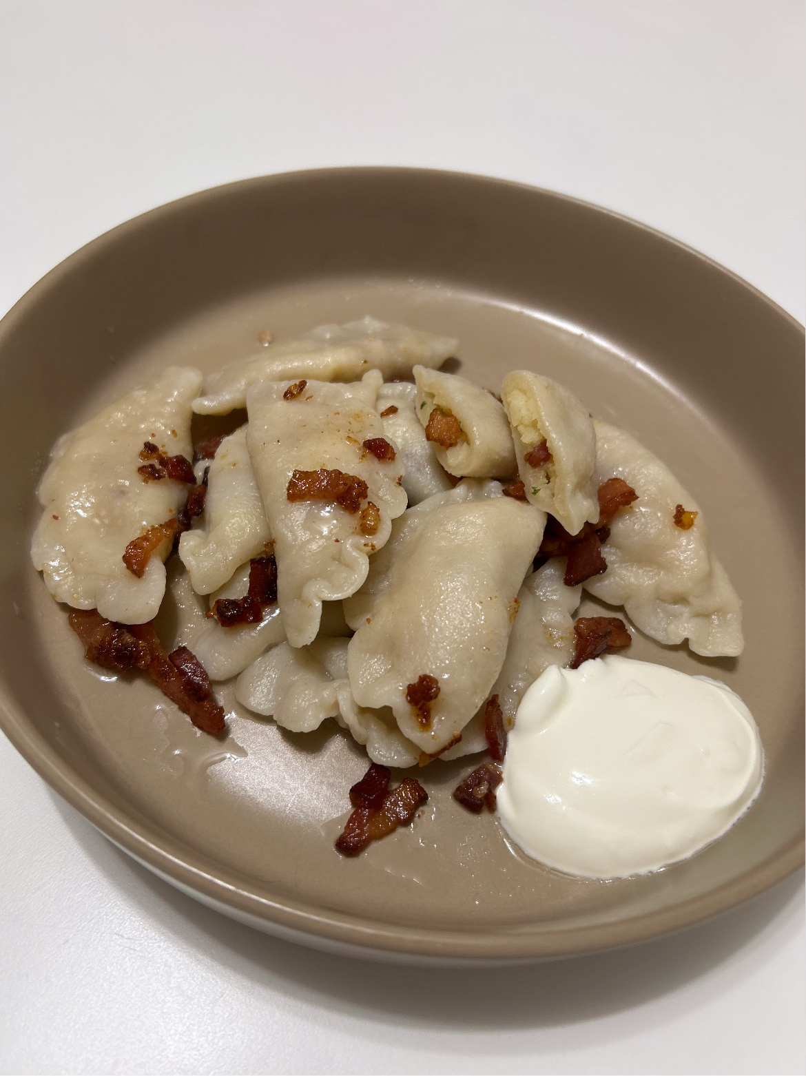 Homemade dumplings with potato and bacon