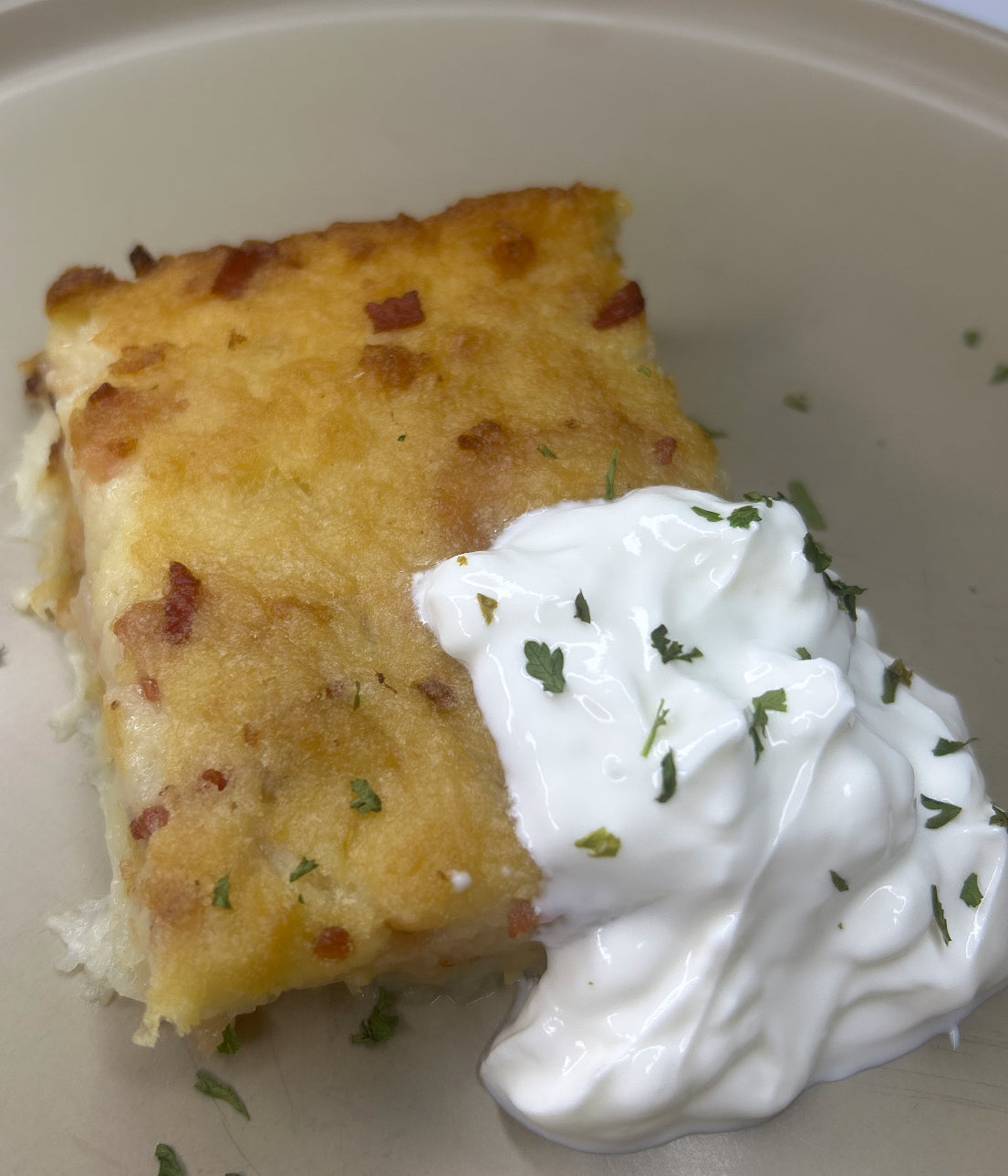 Homemade potato pie “Kugelis” with bacon filling