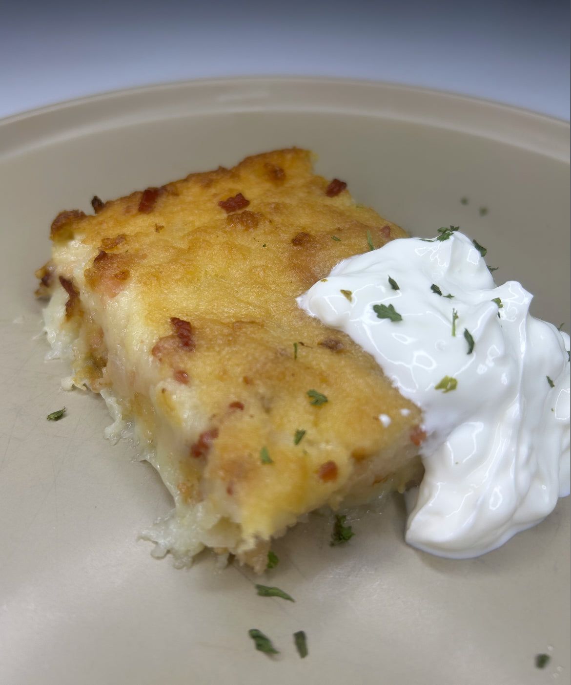 Homemade potato pie “Kugelis” with bacon filling